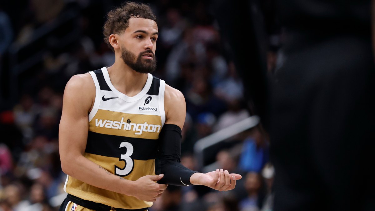 Trae Young divierte en su debut con los Wizards